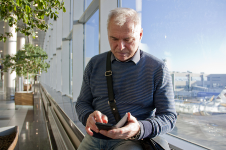 a man of retirement age at the airportの写真素材