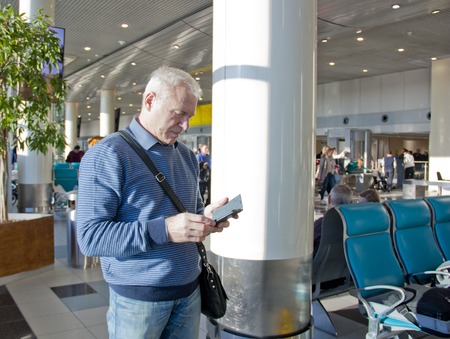 a man of retirement age at the airportの写真素材