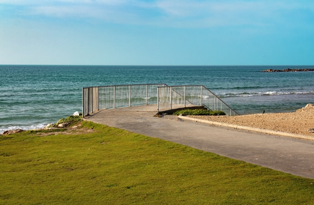 A stairs leading to the sea shoreの写真素材