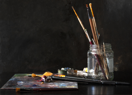 Working set of the painter with oil paintsの写真素材