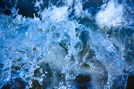 Sea wave in frozen motion as background