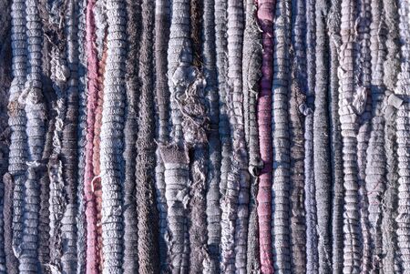 rough knitted fabric rug texture as rustic backgroundの写真素材