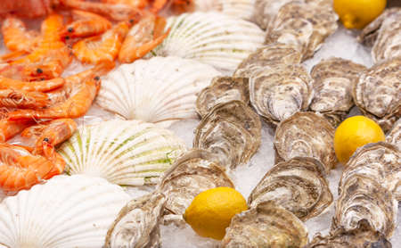 Fresh seafood in ice on the counter of the Boqueria market