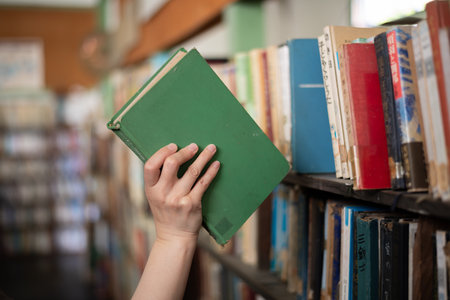 Pick up a bookの写真素材