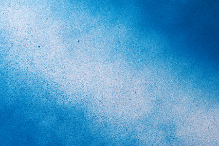 Blue spray paint backgroundの写真素材