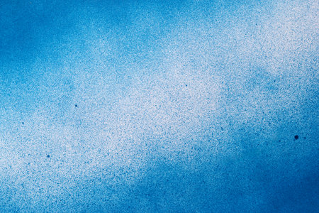 Blue spray paint backgroundの写真素材