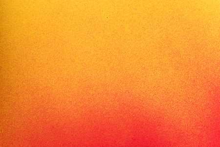 Red and yellow spray paint backgroundの写真素材