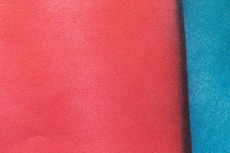 Red and blue spray paint background