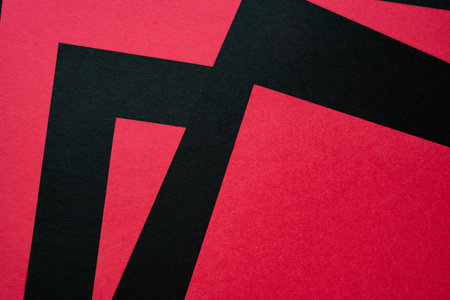 Overlapping red and black construction paperの写真素材
