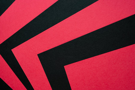 Overlapping red and black construction paperの写真素材