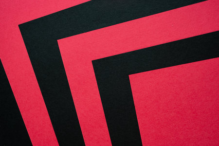 Overlapping red and black construction paperの写真素材