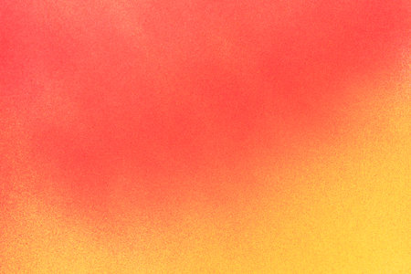 Red and yellow spray paint backgroundの写真素材