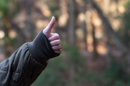 Finger pose thumbs upの写真素材