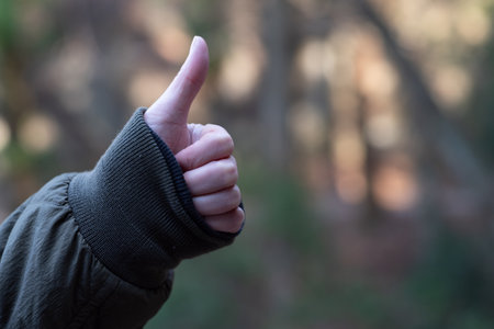 Finger pose thumbs upの写真素材