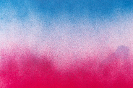Red and blue spray paint backgroundの写真素材