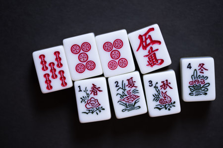 Mahjong tiles on a black backgroundの写真素材