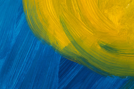 Blue and yellow painted backgroundの写真素材