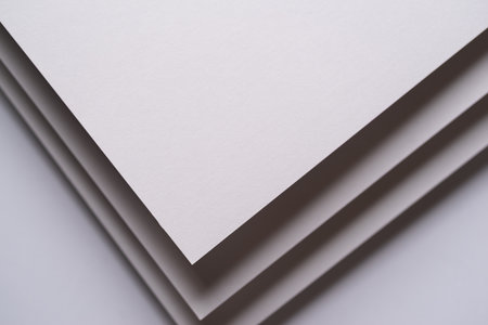 Overlapping white construction paperの写真素材