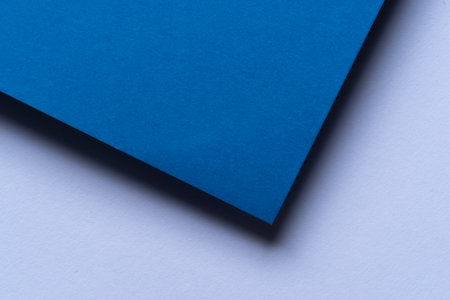 Overlapping blue and white construction paperの写真素材
