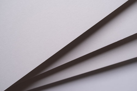 Overlapping white construction paperの写真素材