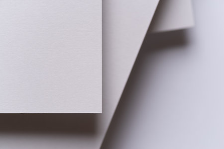Overlapping white construction paperの写真素材