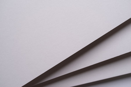 Overlapping white construction paperの写真素材