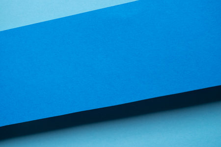 Overlapping blue construction paperの写真素材