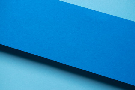 Overlapping blue construction paperの写真素材