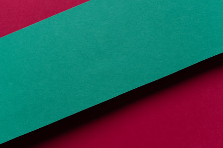 Overlapping red and green construction paper