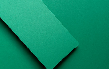 Overlapping green construction paper