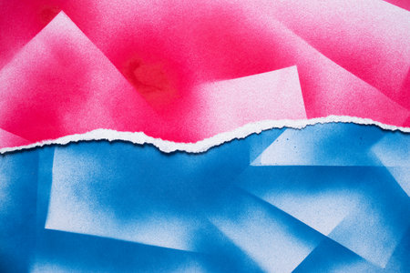 Torn blue and red paper backgroundの写真素材