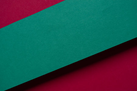 Overlapping red and green construction paperの写真素材