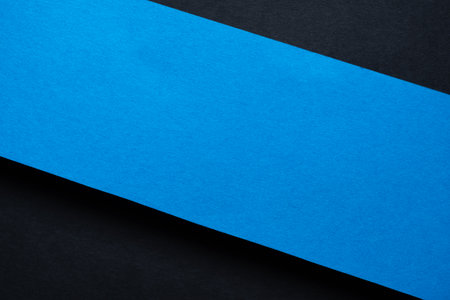 Overlapping blue and black construction paperの写真素材