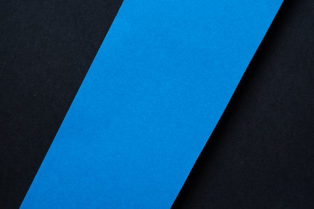 Overlapping blue and black construction paperの写真素材