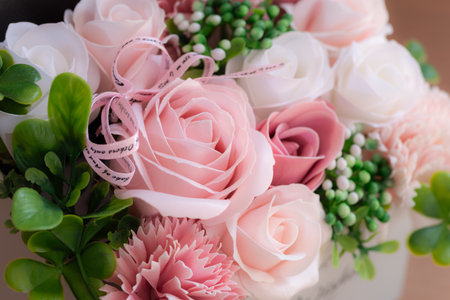 Beautiful pink artificial rose flowerの写真素材