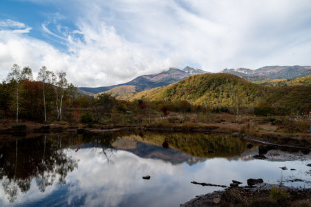 Norikura Plateau in autumn with Mount Norikura reflected in the backgroundの写真素材