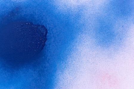 Blue spray paint backgroundの写真素材