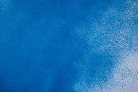 Blue spray paint backgroundの写真素材