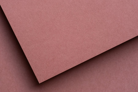 Overlapping pink construction paper