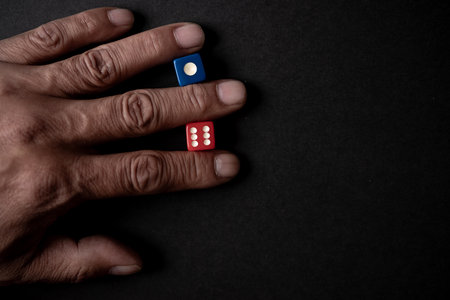 Person holding diceの写真素材