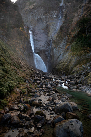 Beautiful Shomyo Falls in autumn with autumn leaves