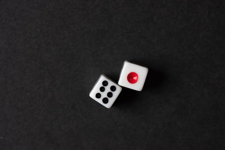 Two dice on a black backgroundの写真素材