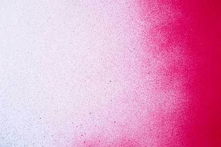 Red and blue spray paint backgroundの写真素材