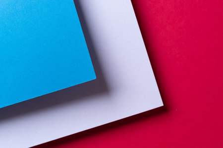 Blue, white, and red overlapping construction paper
