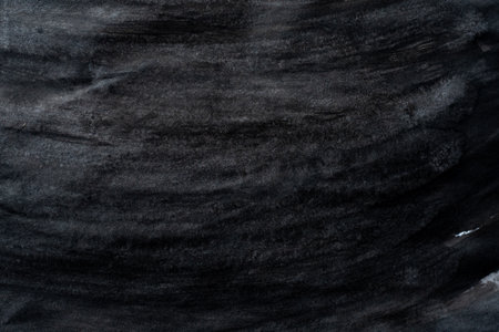 Black ink backgroundの写真素材