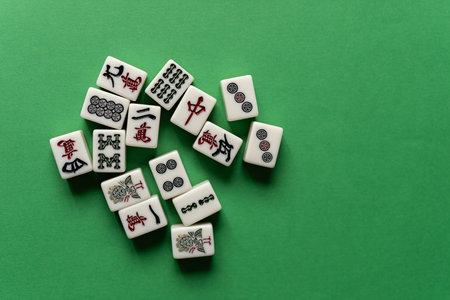 Mahjong tiles on a green backgroundの写真素材