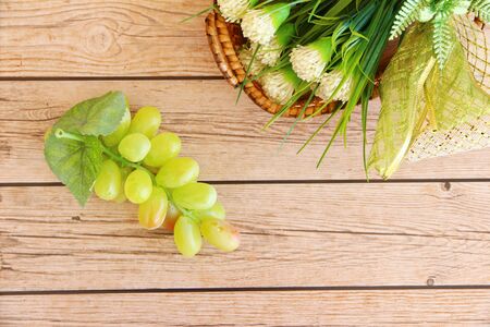 Portion of fresh Green Grapes on vintage wooden backgroundの写真素材