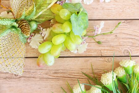 Portion of fresh Green Grapes on vintage wooden backgroundの写真素材