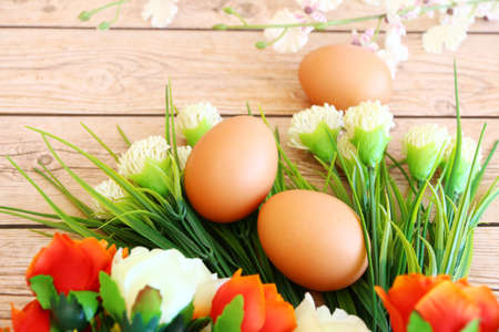 Fresh eggs on wood backgroundの写真素材