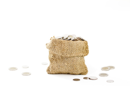 Isolated Jute Money Bag Full of Coins on white background from my idea.